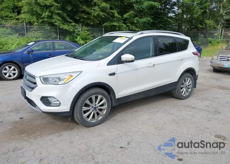 2017 Ford Escape Titanium z USA, uszkodzony, nr VIN 1FMCU9J92HUA73499